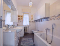 a kitchen with a sink and a bath tub